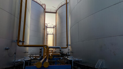 Fuel storage tank oil. Large white industrial for tank oil. Crude oil export factory industry And storage tank . industrial pipes 
