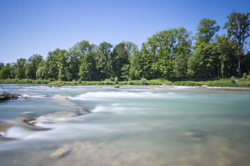 Longtime Exposure of River with River Steps and River Bank in Munich, Bavaria, Germany, Europe