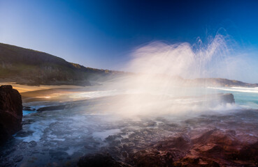 Fototapeta premium Strong Wave Crashing Rocky Coastline in Eurobodalla National Park
