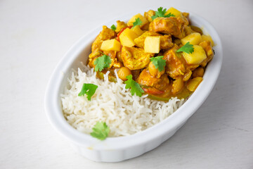 Homemade Mango Coconut Curry Chicken with White Rice and Garlic Naan Flatbread
