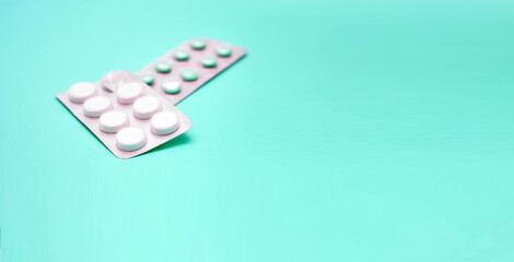 medical pills pills on colored pastel background copy space