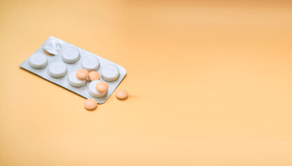 medical pills on colored background