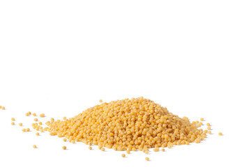 A small pile of millet groats on the table.