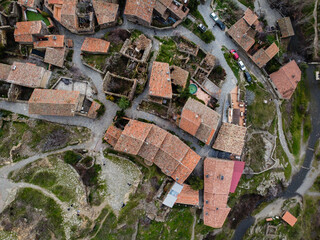 Aerial view of the antique and touristic village of Patones de Arriba, Madrid, Spain. Slate stone architecture
