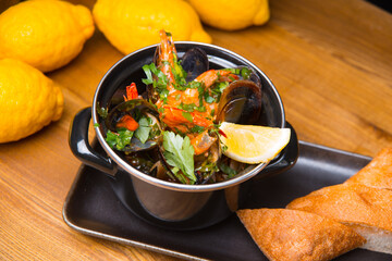 Photo of tasty delicious fresh mussels boiled in a pan, sea food.