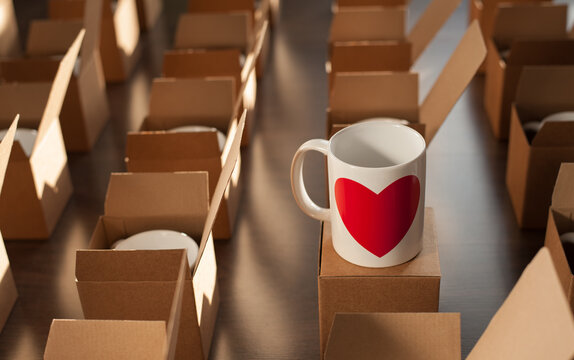 warehouse of white mugs with a heart in cardboard boxes.