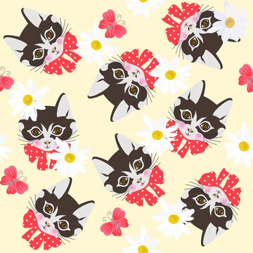 Cute faces of cats with red bows with white polka dots, pink butterflies and daisies on a light yellow background. Seamless pattern for baby.