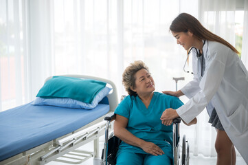 Fototapeta premium young woman doctor examining female patient person in hospital, health care concept