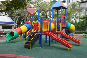 Tunnel and Slide , Colorful Playground for Children in the Park, Kids Corner