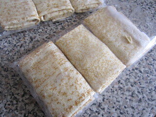 semi-finished stuffed instant pancakes in polyethylene packaging