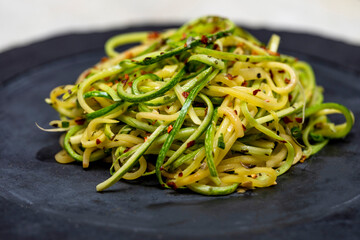 Zucchini spaghetti with dehydrated pepperoni pepper