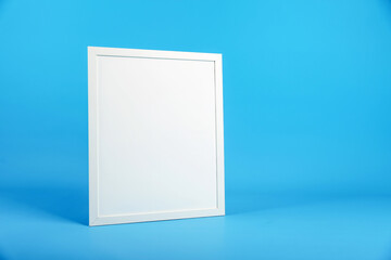 white square frame with mock up on blue background with copy space.