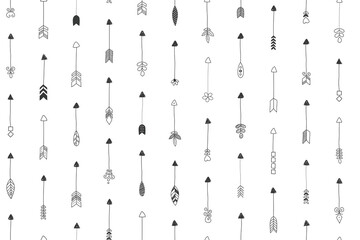 Seamless pattern with a hand drawn arrows. Wrapping paper and fabric pattern. 