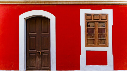 Red wall of house in fontainhas Panjim Goa.