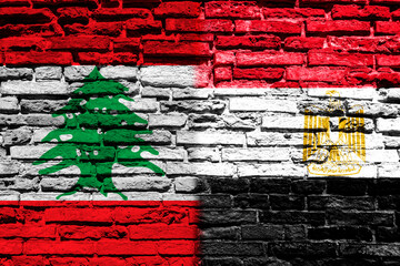 Flag of Lebanon and Egypt on brick wall