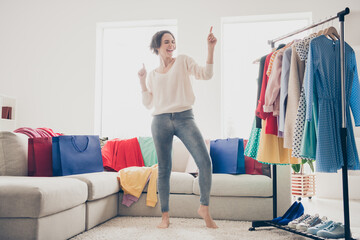 Full size photo of happy funky woman dance good mood wardrobe buy clothes good mood indoors inside...