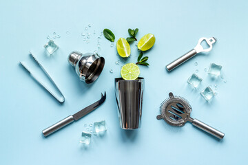 Flat lay of bar accessories and ingredients for mojito cocktail
