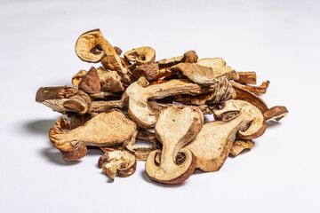 Dried mushrooms Boletus edulis isolated on white background