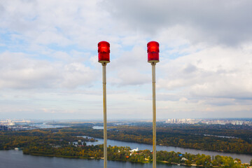 signal lights for aircraft on the roof of a tall house and sky with clouds
