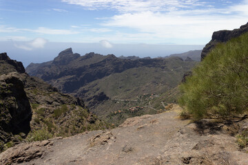 Landscape photograph of mountains and a village