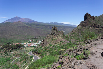 Landscape photograph of mountains and a village