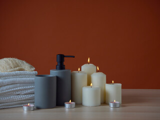 Spa composition with burning aromatic candles