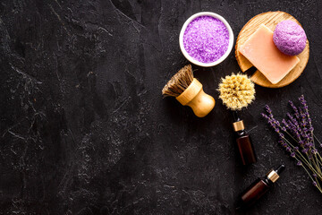 Fototapeta na wymiar Lavender cosmetics spa set. Natural spa essential oil and sea salt