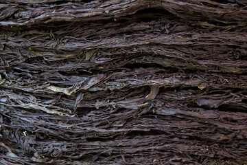 Dried seaweed stacked in a traditional market