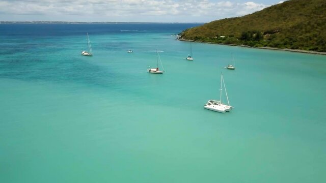 4K Aerial Drone View of Yachts and Boats Anchored in Bay in St Maarten, Caribbean