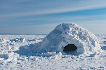 Winter dwelling of Eskimos. Igloo. Eskimos village. - obrazy, fototapety, plakaty