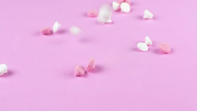 delicious sweet meringue falling dowm to the ink background