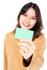 Portrait of a beautiful woman Asian teenagers Showing my credit card With a confident, happy face, a confident, beautiful woman on a white background.