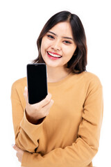Portrait of Asian woman showing or presenting mobile phone application on hand isolated over white background,