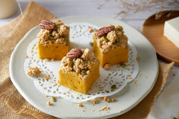 Pumpkin Cube pound cake set on cafe table.