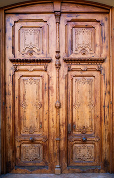 Wooden door with carving elements..