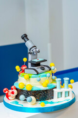 Cake in the form of a microscope..