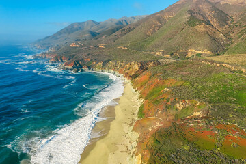 Fototapeta premium Aerial view from a drone, beautiful coastal landscape on Pacific Highway 1, traveling south to Los Angeles, Big Sur, California. Concept, vacation, tourism