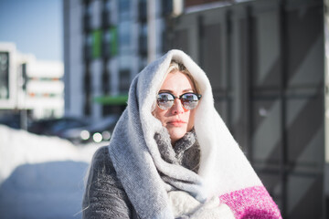 Beautiful russian girl portrait on a snowy street
