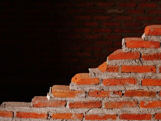 A brick wall being built.