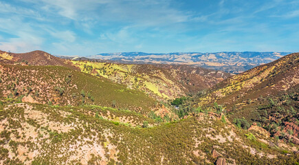 Fototapeta na wymiar Aerial view of rock formations in Pinnacles National Park in California, ruined remains of an extinct volcano on the San Andreas Fault. Beautiful landscapes