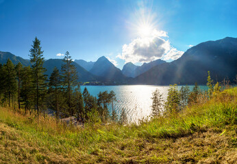 view over turquoise lake achensee to karwendel alps, bright sunshine
