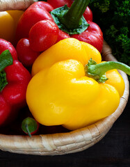 Large yellow bell pepper on a straw plate