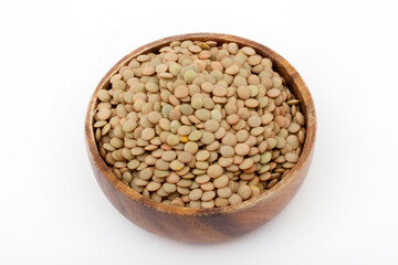 Dry green lentils in bowl