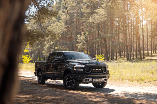 Kherson, Ukraine - May 2019: powerful american pickup Dodge Ram in the forest.