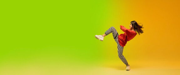 Flyer. Stylish sportive girl dancing hip-hop in stylish clothes on colorful background at dance...