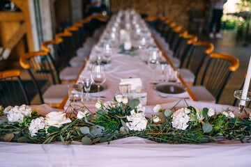 Beautiful table set for an event party or wedding reception . restaurant interior.