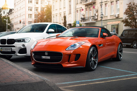 Kyiv, Ukraine - August 2020. Jaguar F-Type S in a beautiful orange color.