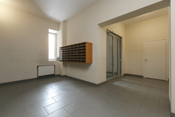 mailboxes in the lobby of an apartment building