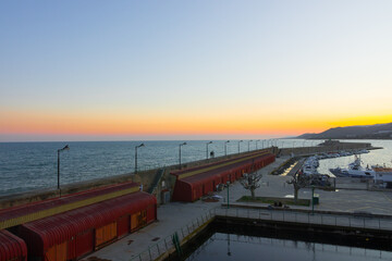 Peniscola, Valencian Community, Spain. Industrial harbour during sunset.