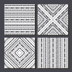 Ethnic seamless patterns. Set of 4 aztec geometric backgrounds. Collection of stylish navajo fabric prints. Tribal modern abstract vector illustration. Vector background in the boho style